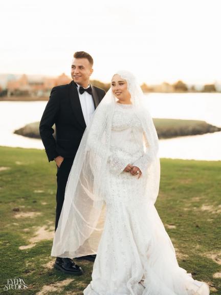 دنيا المال تهنئ العروسين «يوسف وبسمه»بالزفاف السعيد